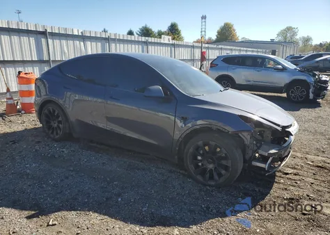 2023 Tesla Model Y z USA, uszkodzony, nr VIN 7SAYGAEE0PF706991